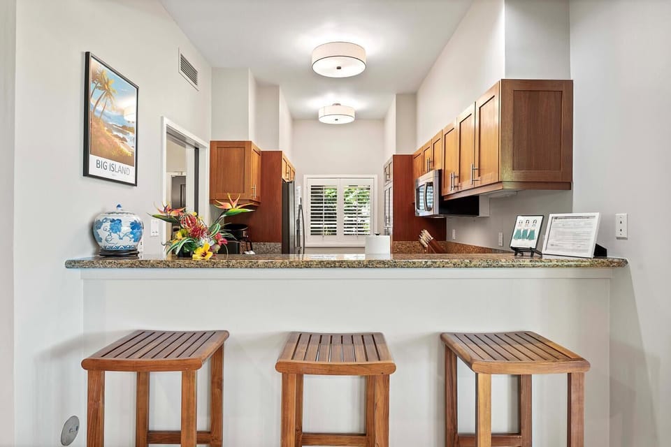 Bar seating open to the kitchen