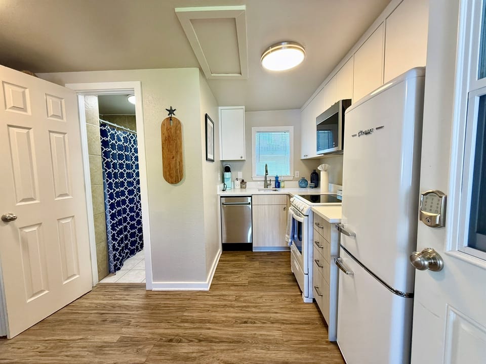 Fully equipped kitchen with modern appliances and everything you need for meals in.