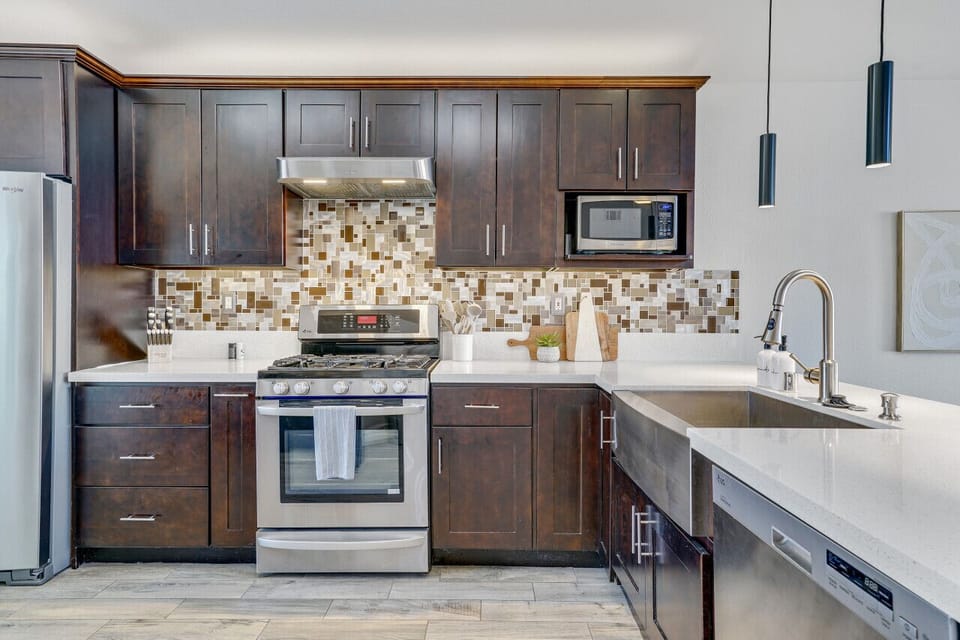 Full kitchen with stainless steel appliances