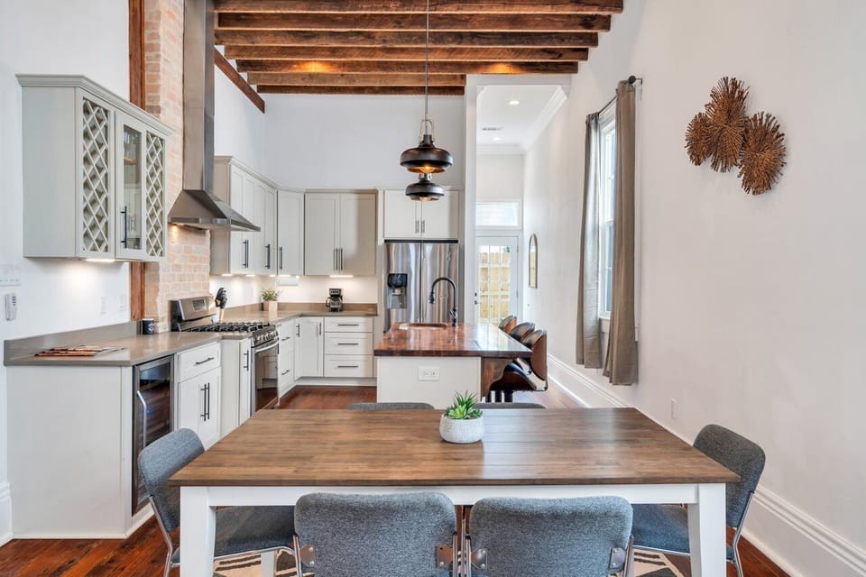 Stylish kitchen w/ pendant lighting & plenty of prep space.
