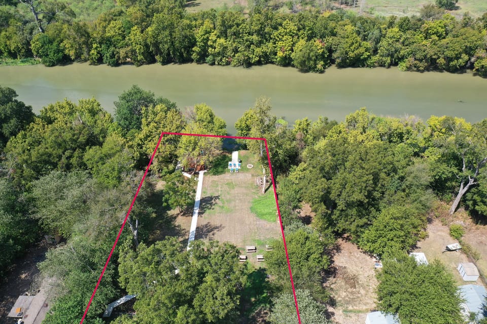 Aerial from street towards river view