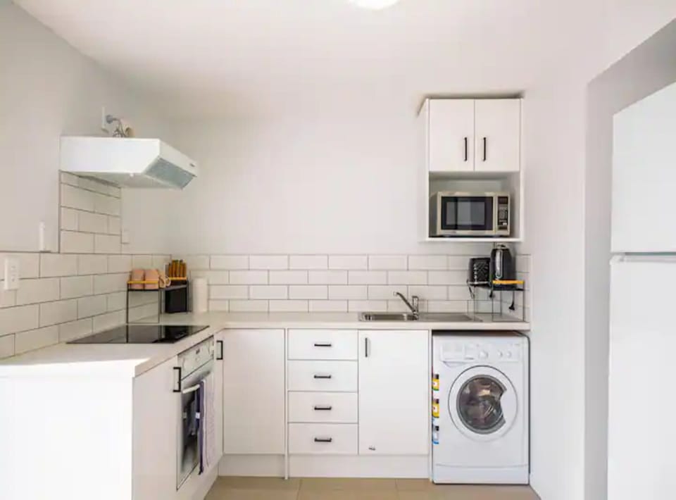 Apartment | Private kitchen | Full-size fridge, microwave, stovetop, electric kettle