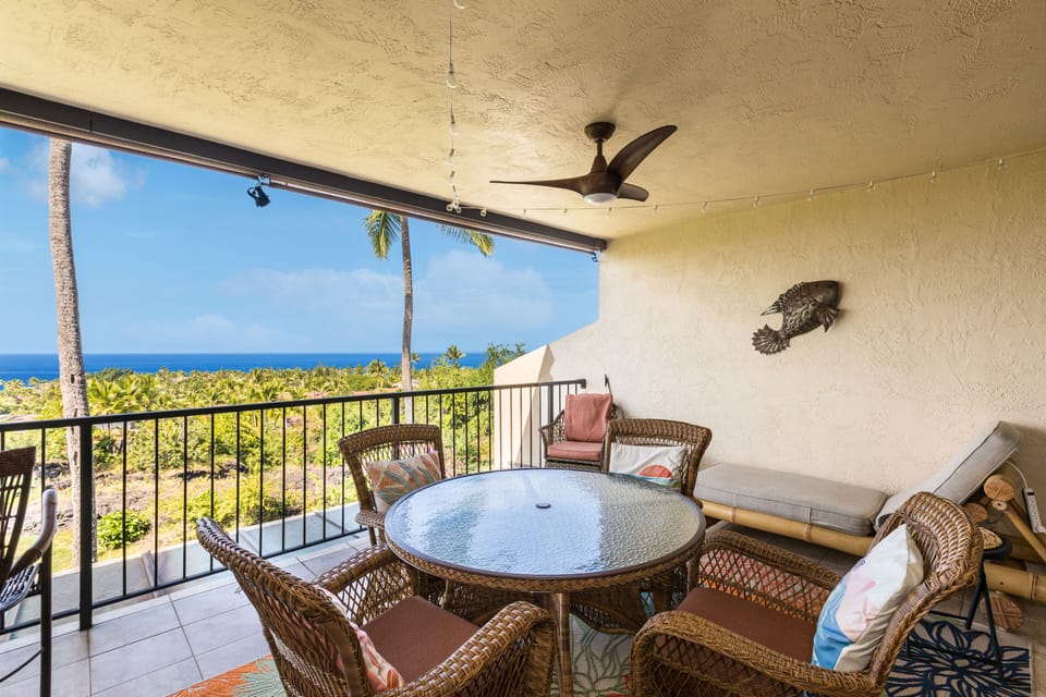 Enjoy the boats, golfers and countless coconut palms swaying in front of the sunset.