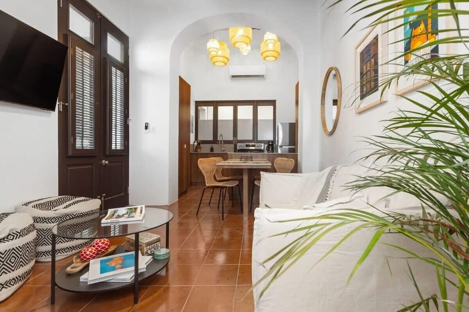 The living areas open up to the outdoor terrace.