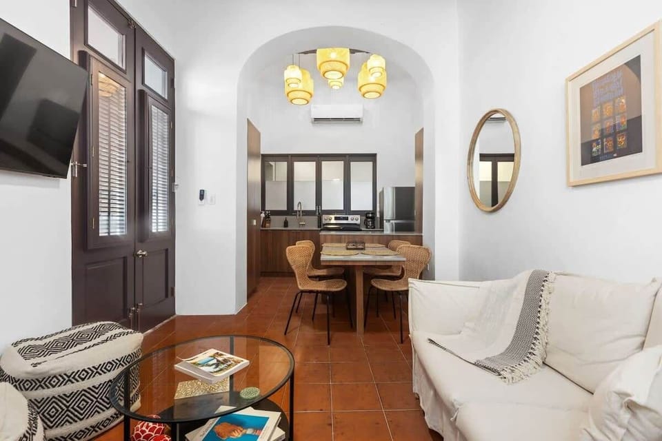 The living room, dining and kitchen.
