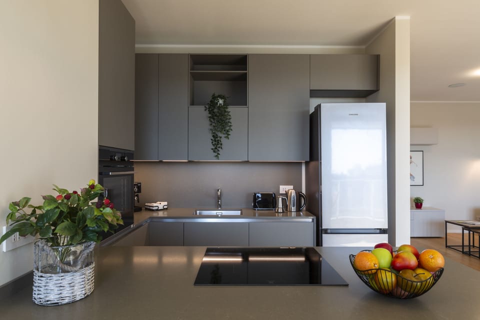 Luxury Apartment | Private kitchen | Espresso maker, full-size fridge, oven, stovetop
