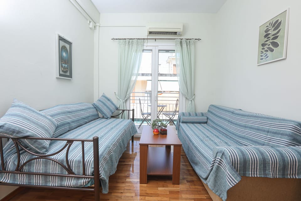 City Apartment | Living area | 32-inch LCD TV with cable channels