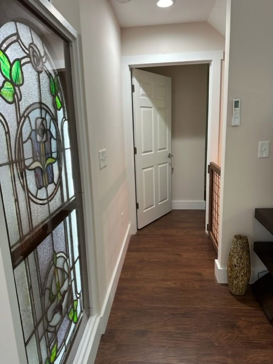 Top of stairs from guest bedroom showing gate on right.
Master bedroom door.