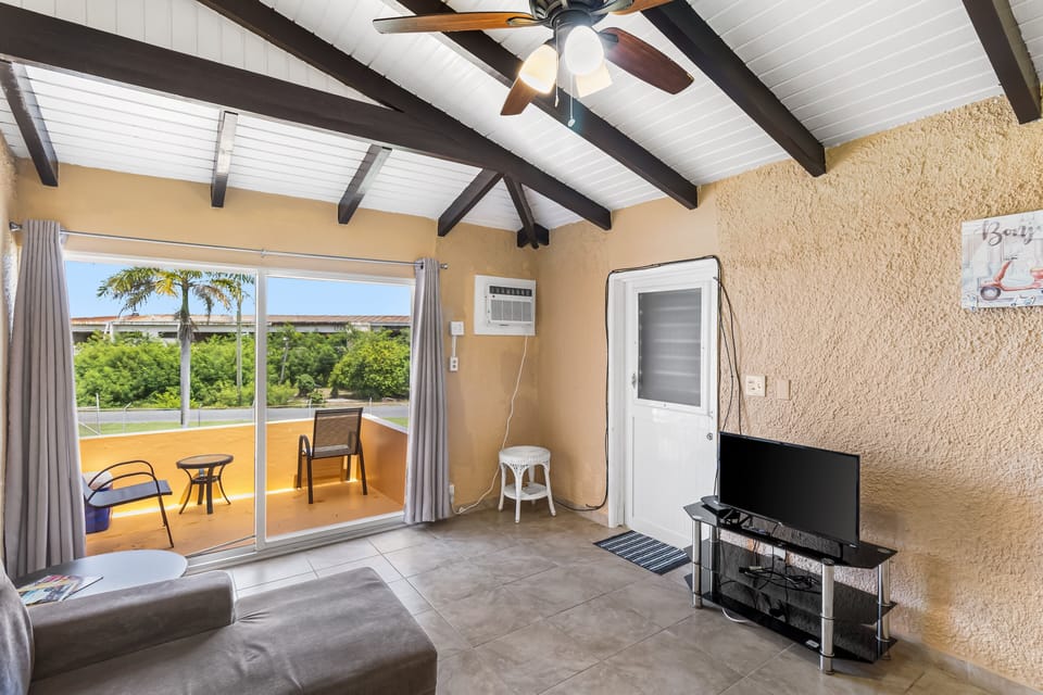 One complete condominium with all the furnishings and comforts. Your balcony overlooks the eighth-foot pool just a few feet from your doorstep. There are restaurants that specialize in local, Latin, and Caribbean food within walking distance—plenty of free onsite parking.