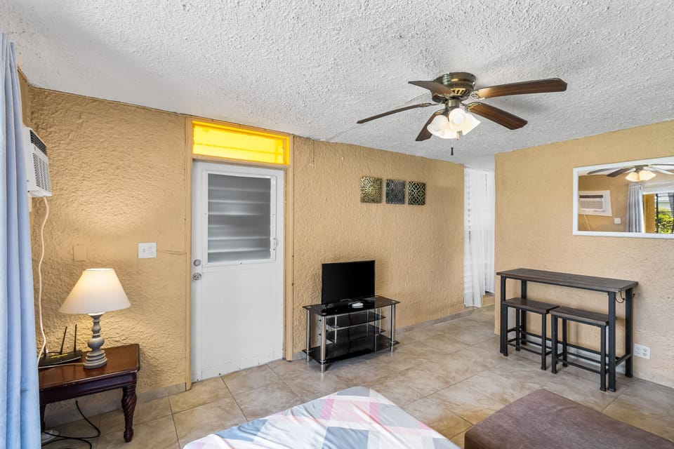 One complete condominium with all the furnishings and comforts. Your balcony overlooks the eighth-foot pool just a few feet from your doorstep. There are restaurants that specialize in local, Latin, and Caribbean food within walking distance—plenty of free onsite parking.