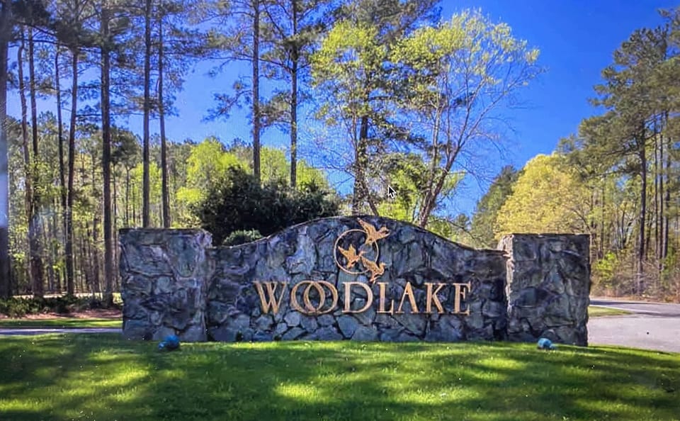 WOODLAKE COUNRY CLUB:  A Gated  Community with an 18 -hole Championship Golf Course, a 1971 Maples Design fully restored in 2021-2023 with a redesign of the 18th hole by golf architect,  Kris Spence.
