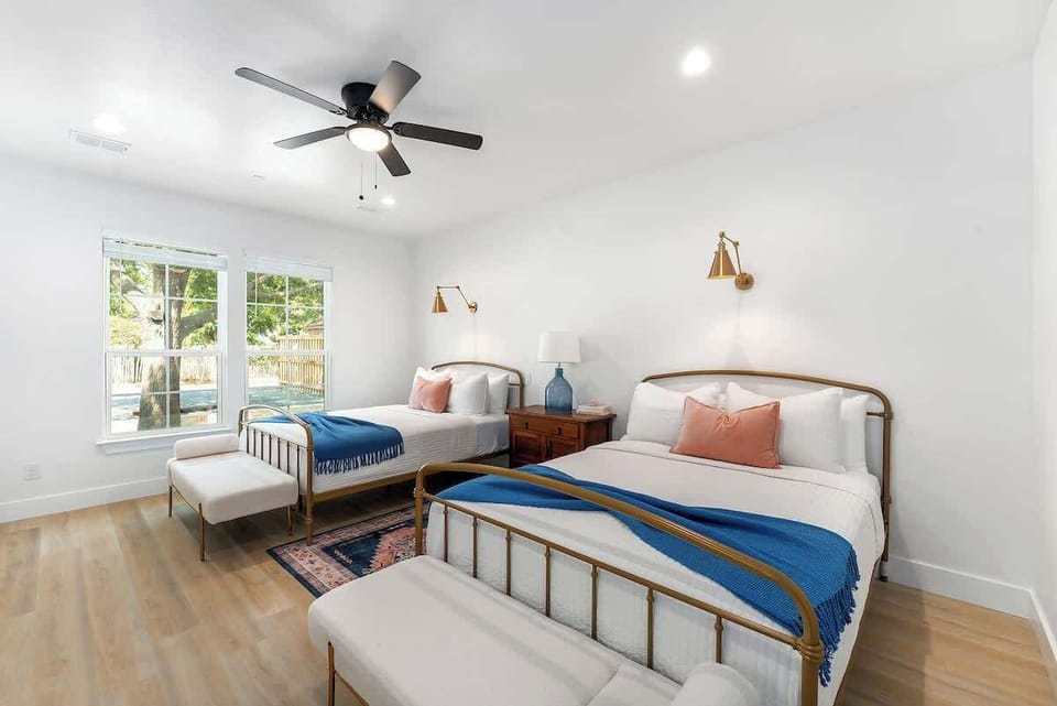 House, Multiple Beds, Hot Tub (306 W Travis Unit C) | 2 bedrooms, individually decorated, individually furnished, bed sheets