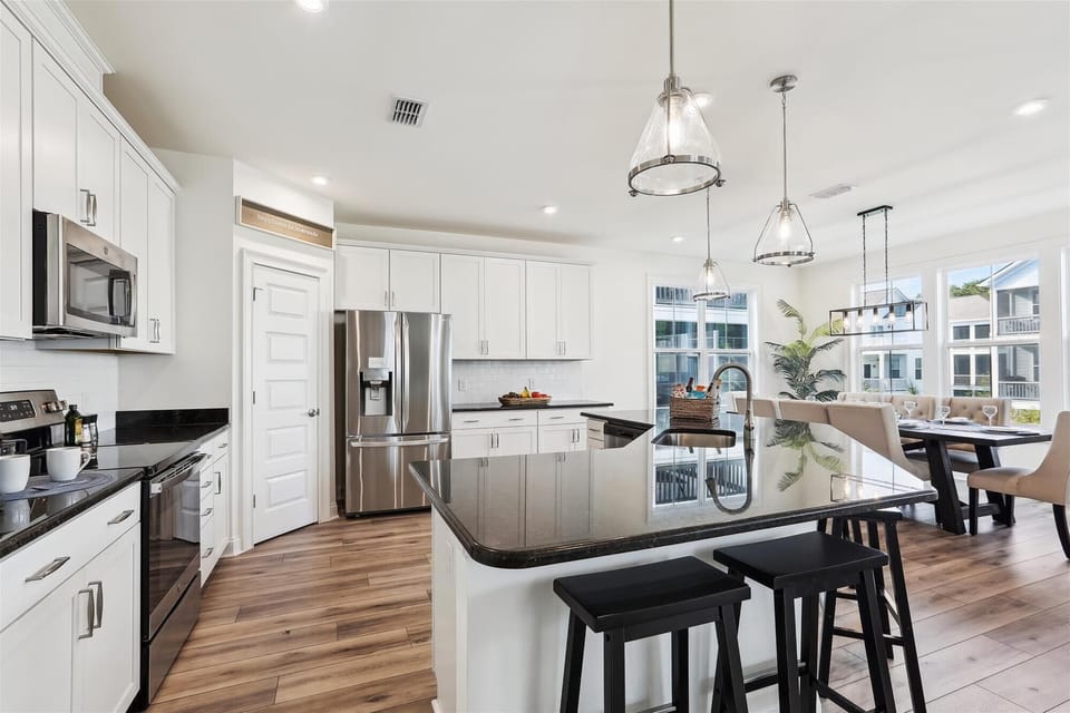 Discover a sanctuary with a newly appointed kitchen featuring state-of-the-art appliances and ample storage, perfect for entertaining.