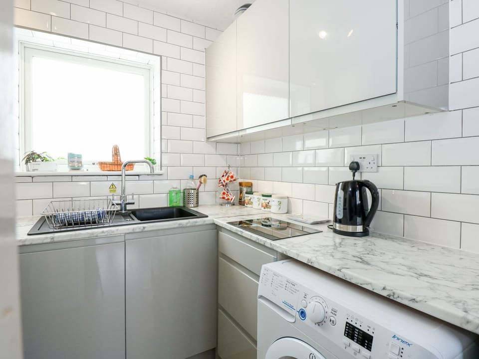 Fridge, electric kettle, toaster, cookware/dishes/utensils