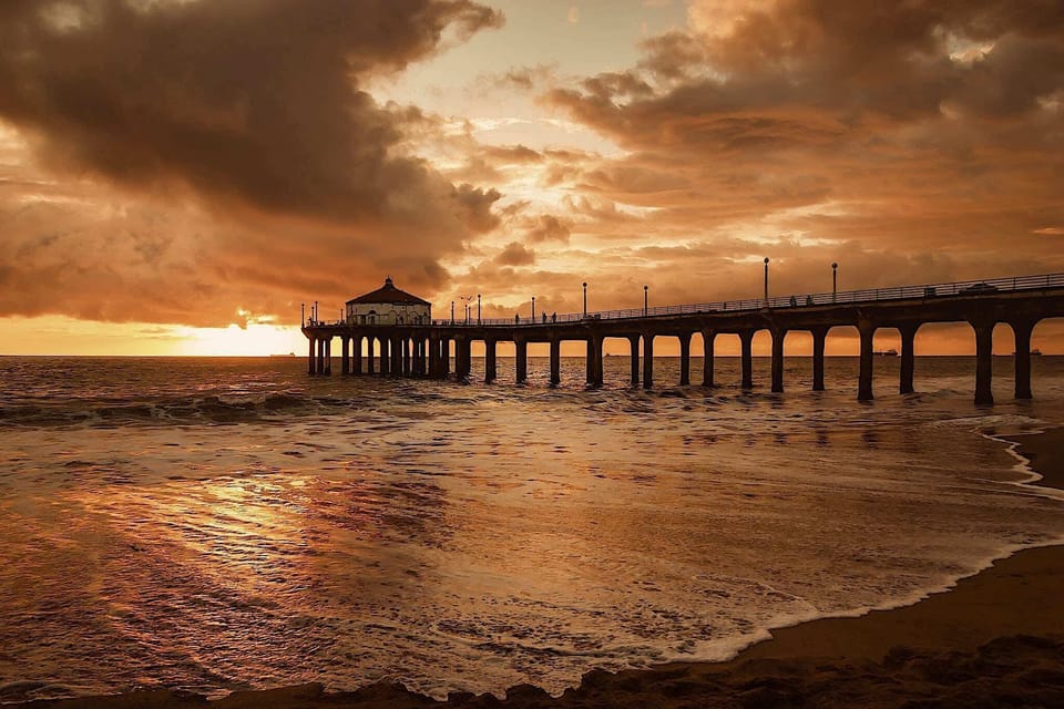 
The Manhattan Beach Pier is a 928-foot historic landmark and the oldest remaining concrete pier on the West Coast, famed for its unique rounded end and the Roundhouse Aquarium.