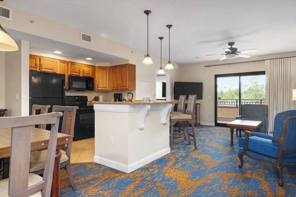 Full Kitchen with additional seating at breakfast counter.