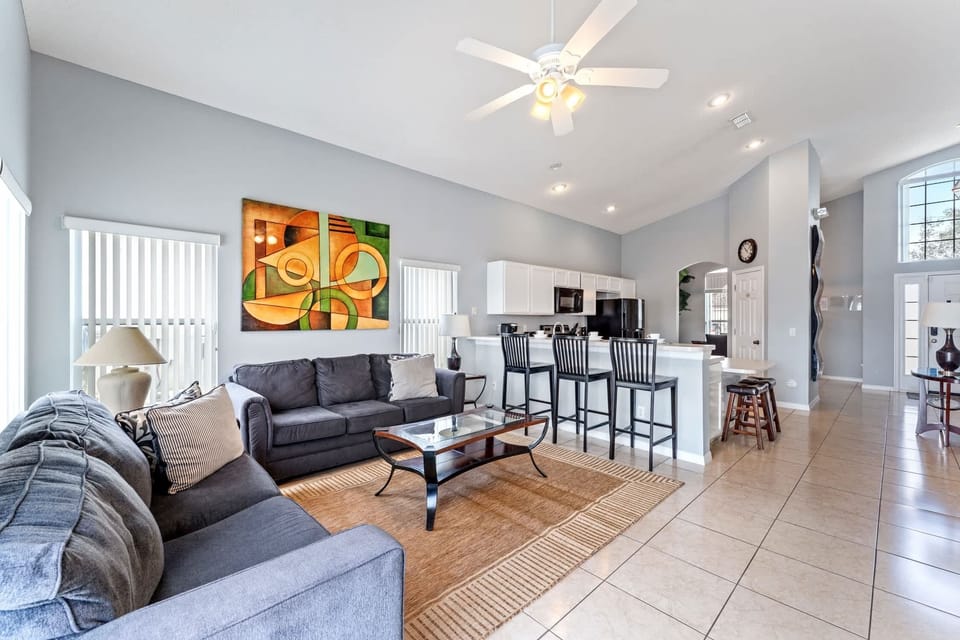 Open Concept, Open Hearts: Our Living Room and Kitchen Welcome You with Open Arms.