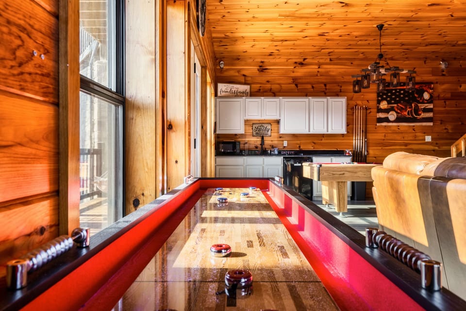 From games to comfy seating to the convenient wet bar including microwave and dishwasher, you'll enjoy our lower level game room and family room.