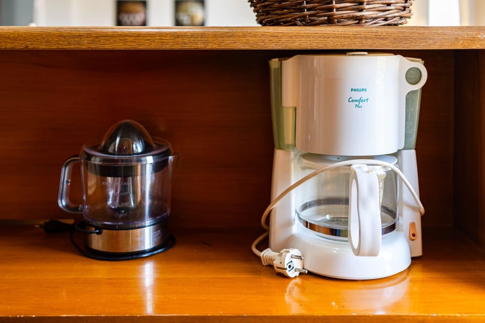 Coffee Station with Essentials – Enjoy fresh coffee every morning with your own in-room setup.