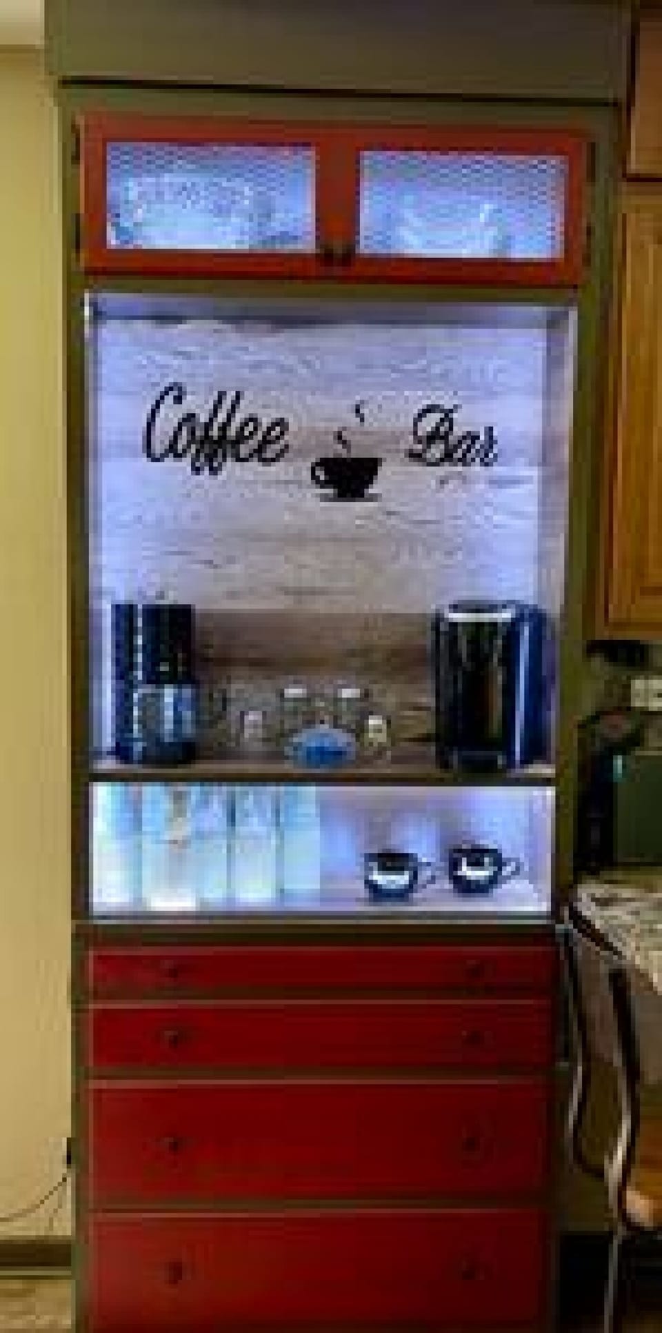 Pull off a couple of doors, take down a shelf or two, polish it up with some paint, lighting and add a little style and you have a Coffee Bar. Enjoy a cup or a whole pot on the house!
