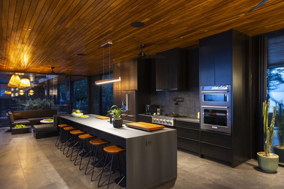Inside fully equipped kitchen and living room.