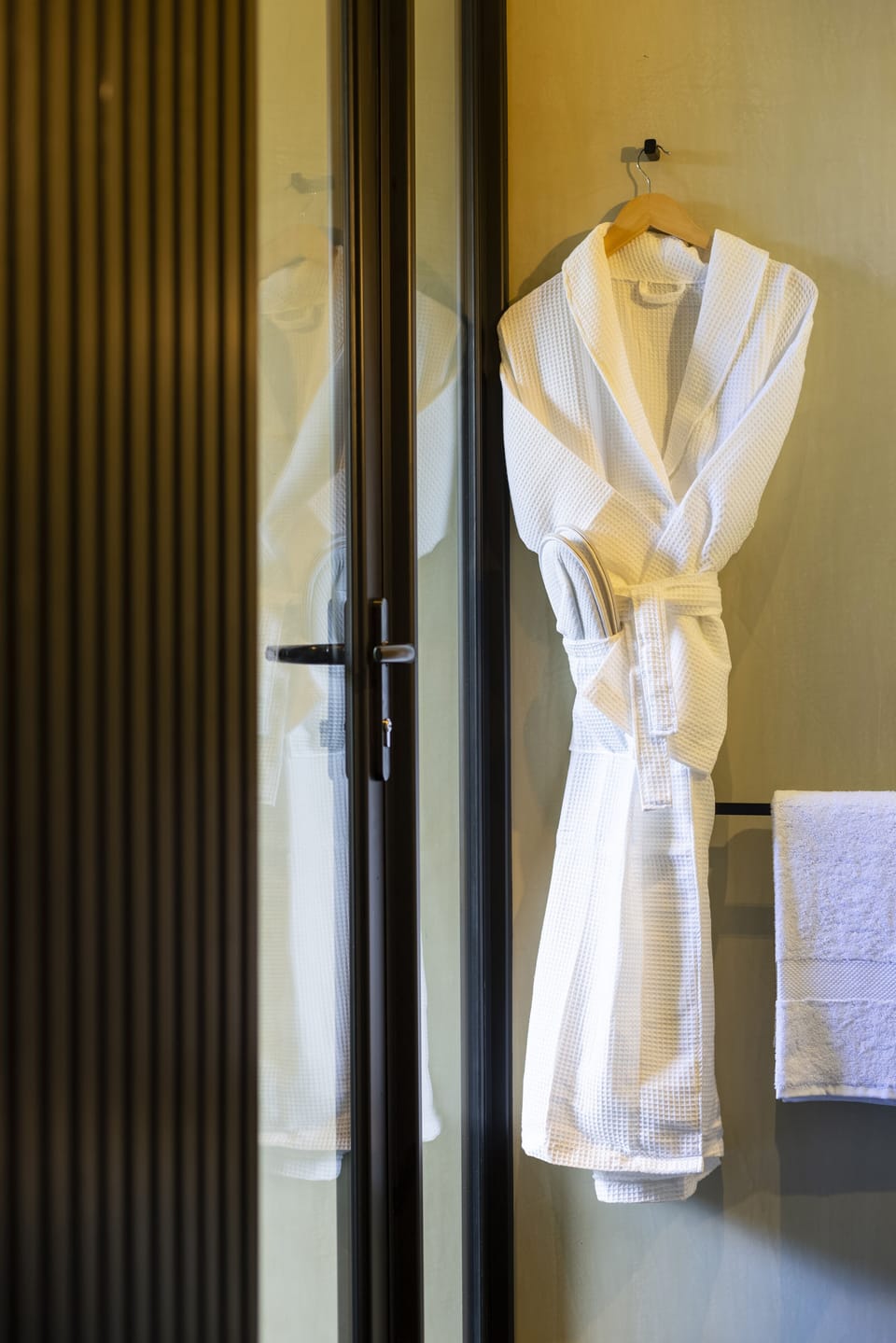 We provide natural cotton bath towels and robes in each bathroom.