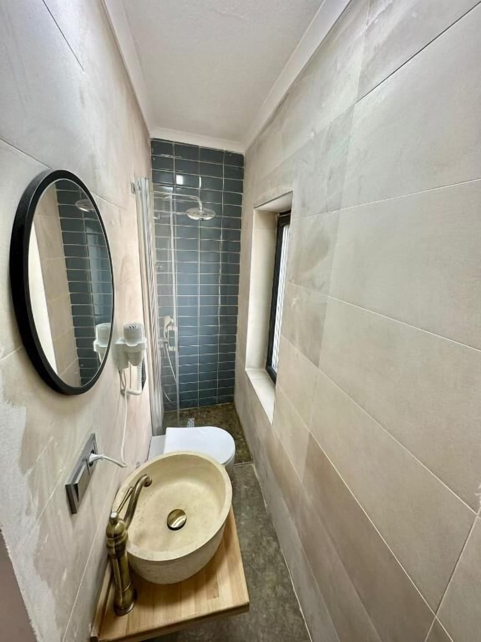 Shower, free toiletries, hair dryer, slippers