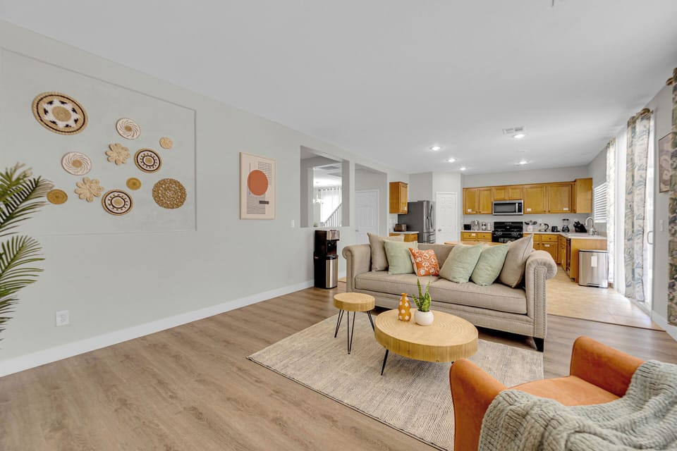 1st Floor family room with cozy sofa, chair & smart TV
