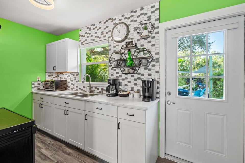The kitchen is stocked with all of the essentials including coffee/tea bar.