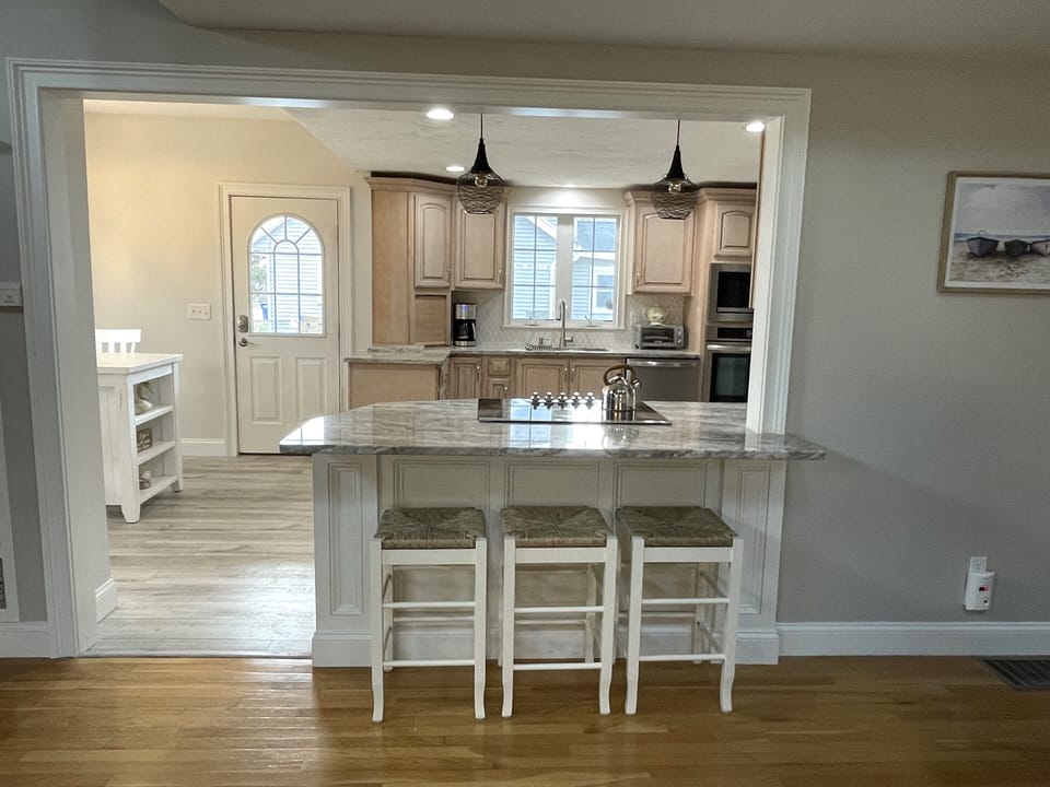Kitchen island with bar stools.