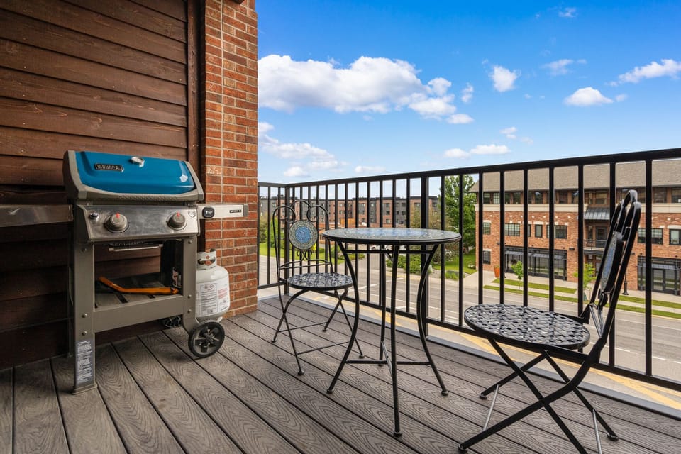 Balcony with bistro seating perfect for leisurely breakfasts. 