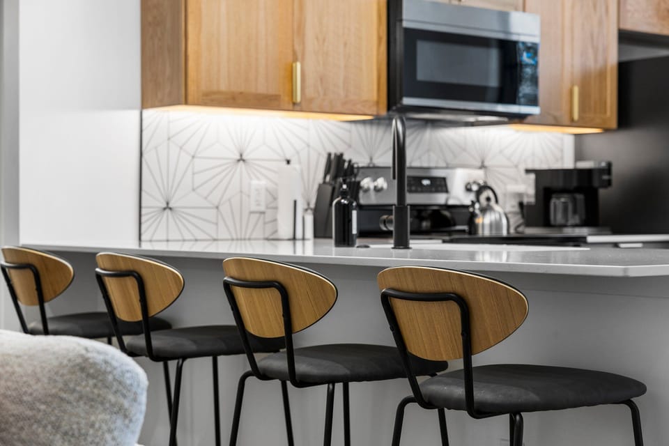 Start your day at the breakfast bar with fresh coffee and conversation, the perfect spot to plan your adventures before heading out to explore.