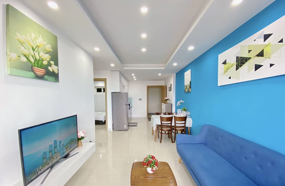 Family Apartment | Living area | 49-inch Smart TV with cable channels