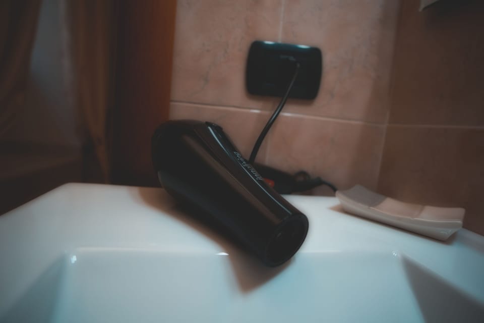 Classic Townhome | Bathroom | Shower, rainfall showerhead, free toiletries, hair dryer