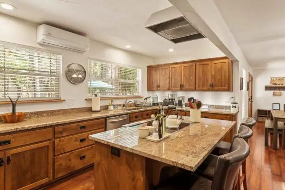 FULLY stocked kitchen with counter seating for the chef in your party.