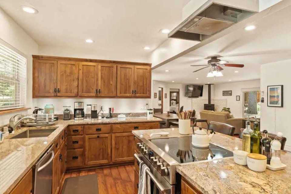 FULLY stocked kitchen with counter seating for the chef in your party.