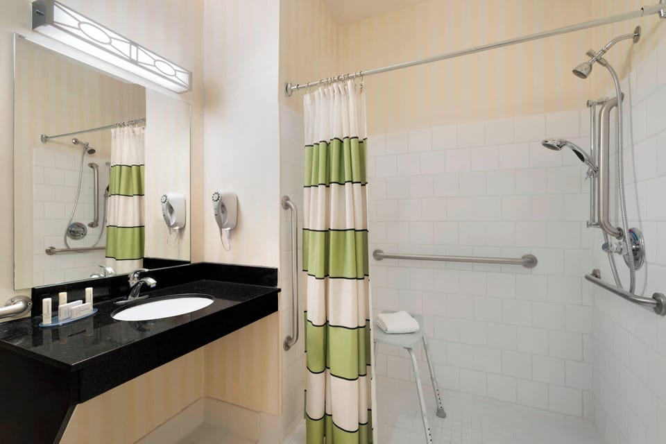 Eco-friendly toiletries, hair dryer, towels