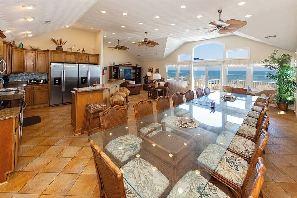 Top-Level Dining Room with Table (seats 16) and Deck Access