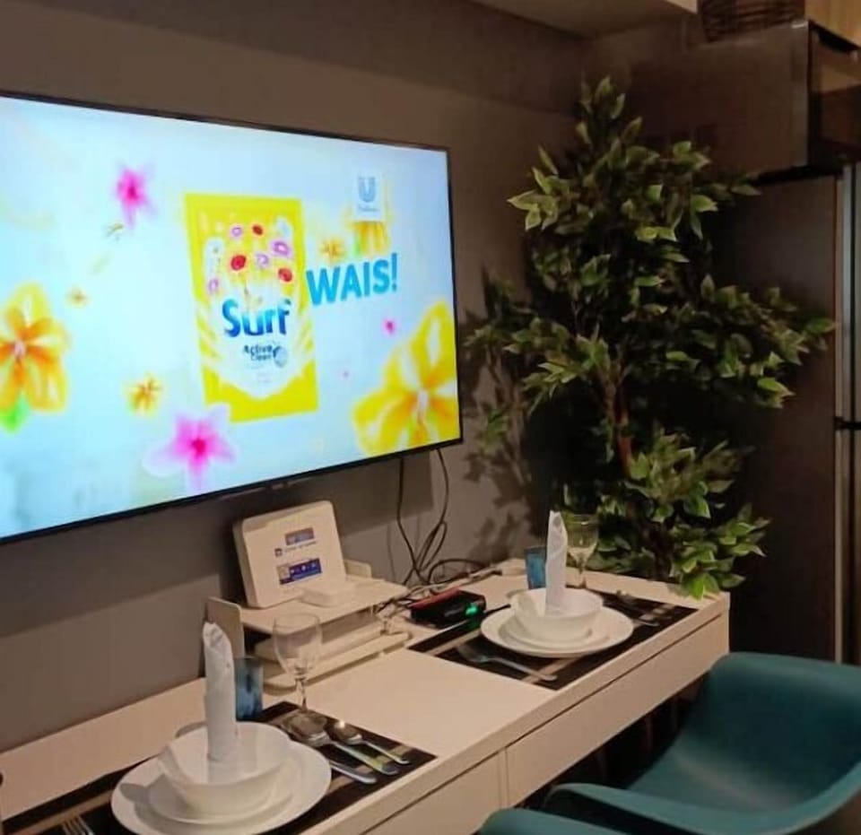 TV Entertainment Area and Dining Area.