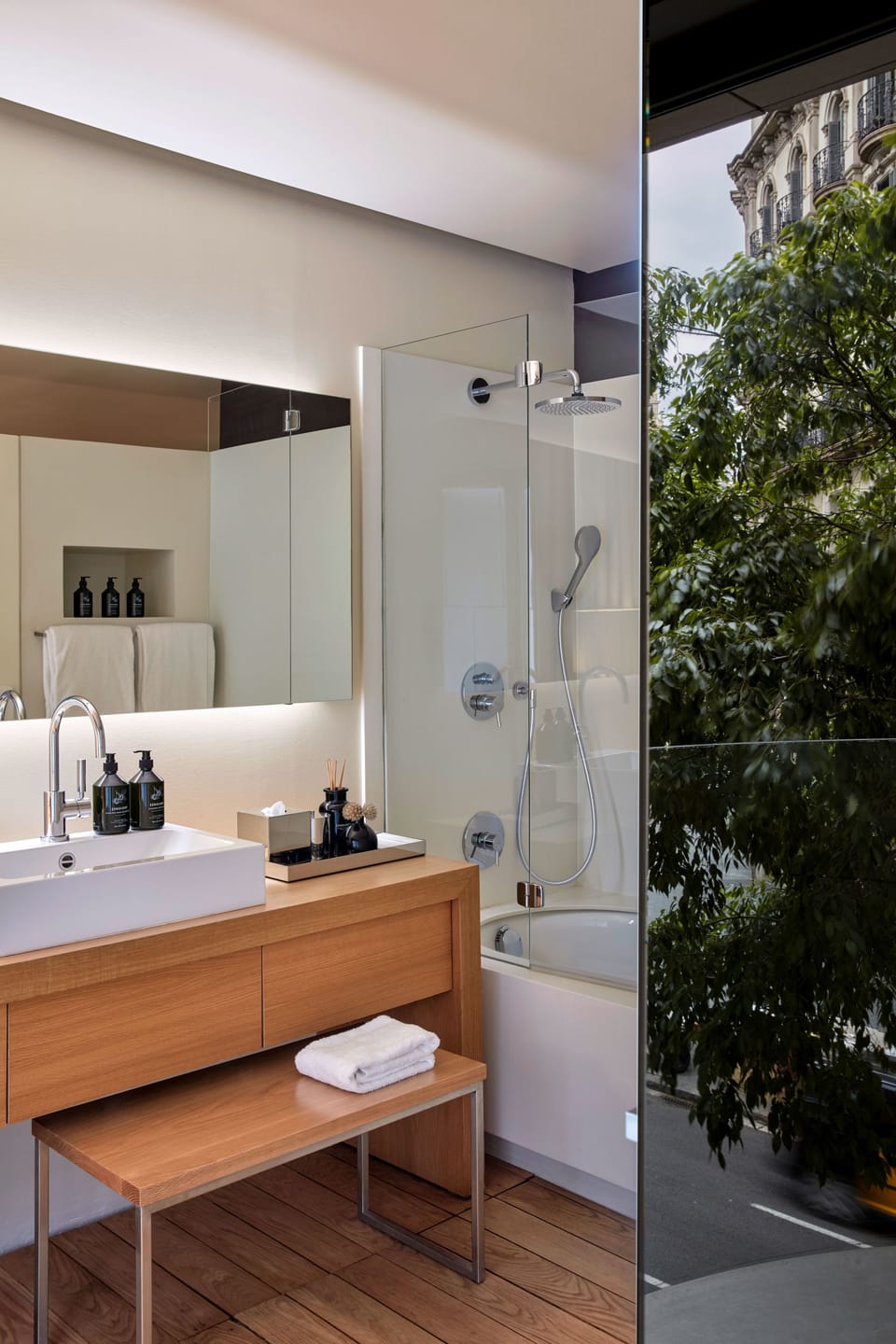 Designer toiletries, hair dryer, bathrobes, slippers