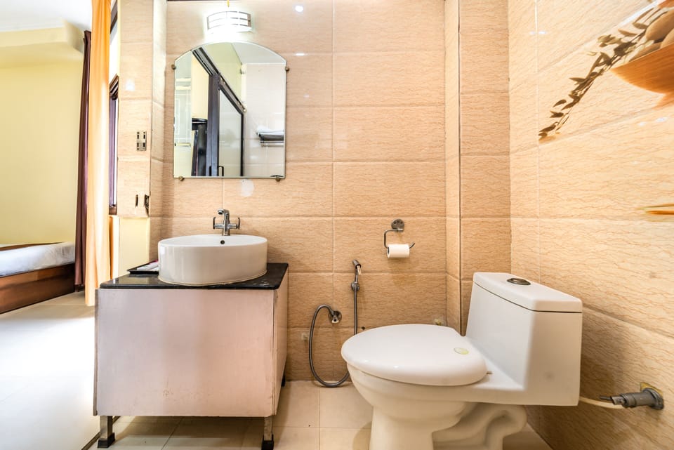 Shower, rainfall showerhead, towels, toilet paper