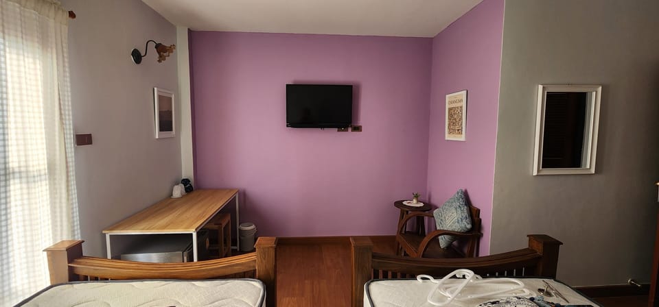Laptop workspace, free WiFi, bed sheets