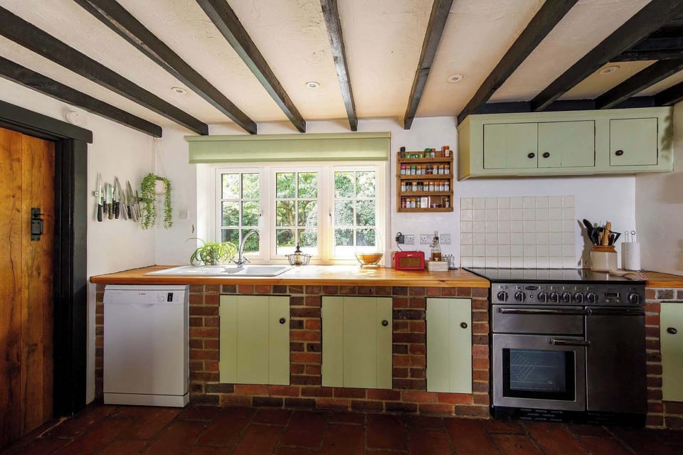 You'll feel right at home in this stunning farmhouse-style kitchen.