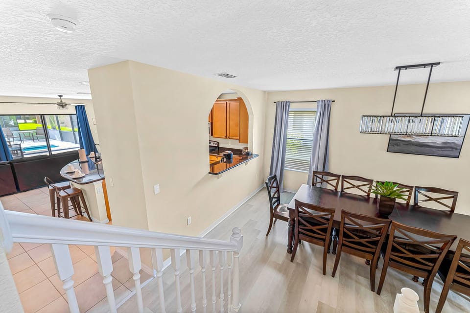 Downstairs: dining room and view of kitchen and living room