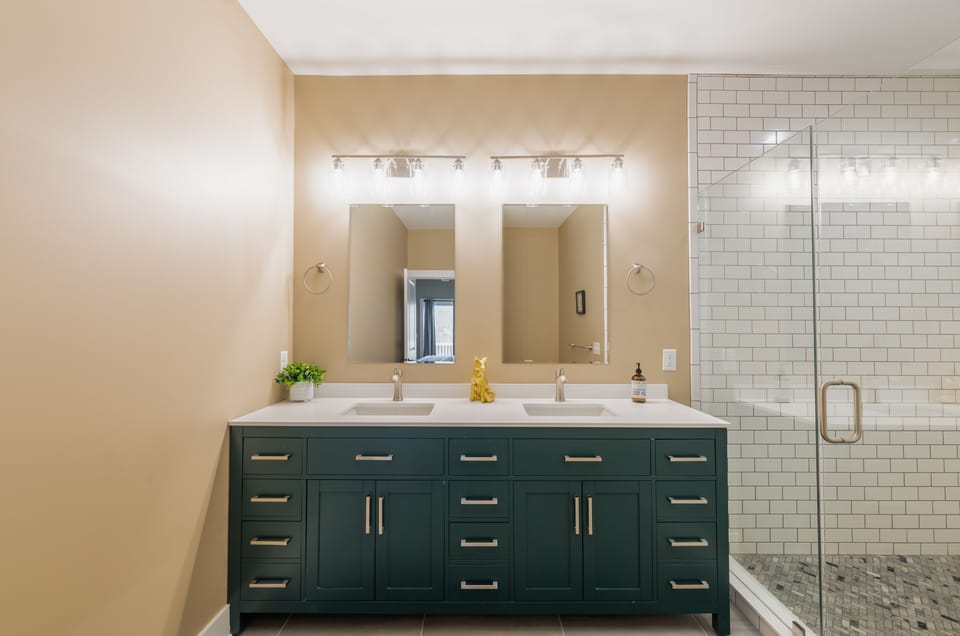 Master bedroom private bathroom with double vanities and HUGE tiled shower