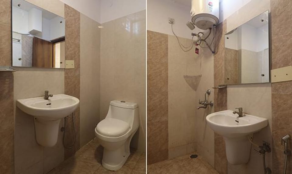 Deluxe Room | Bathroom | Shower, rainfall showerhead, free toiletries, towels