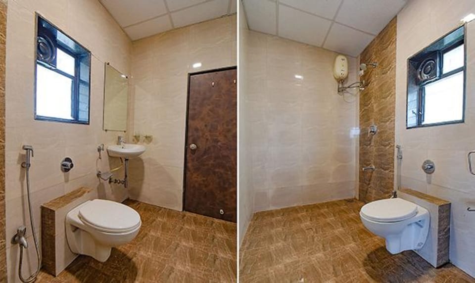 Deluxe Room | Bathroom | Shower, rainfall showerhead, free toiletries, towels