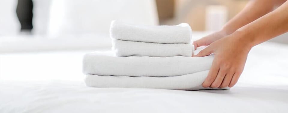 Your stay begins with fresh, fluffy towels ready on your bed—everything you need for comfort from the moment you arrive.