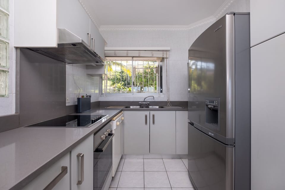 Comfort Apartment | Private kitchen | Full-size fridge, microwave, oven, stovetop