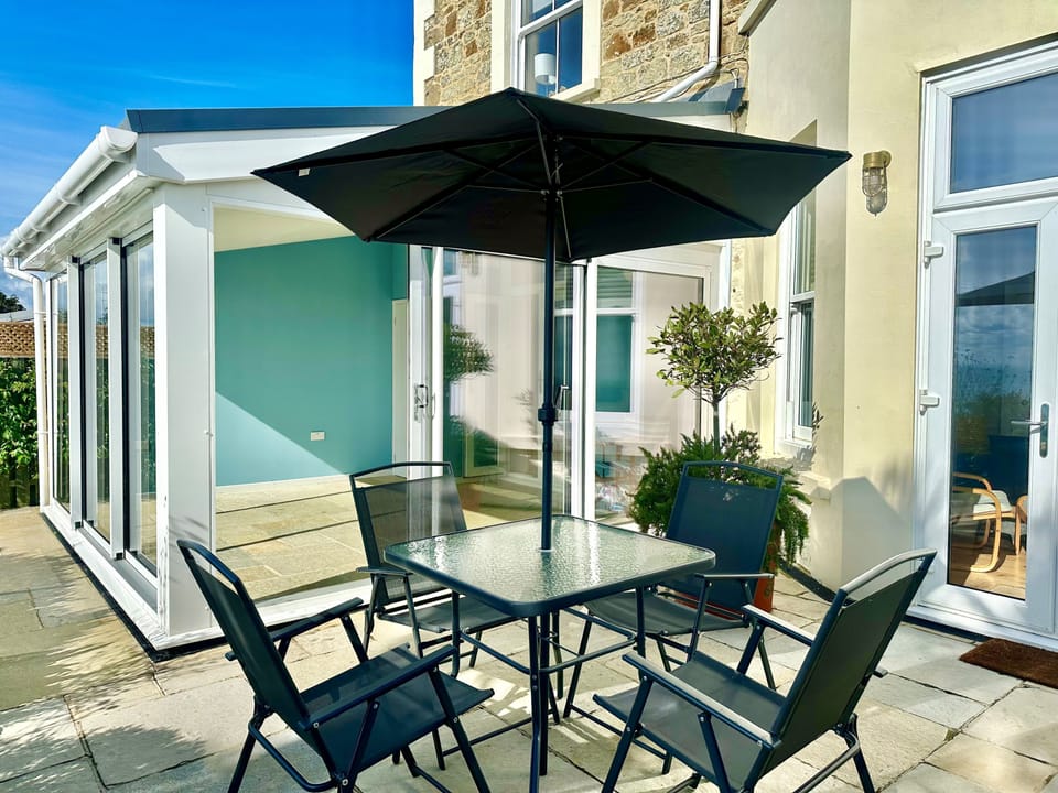 Terrace table and chairs to enjoy some alfresco dining